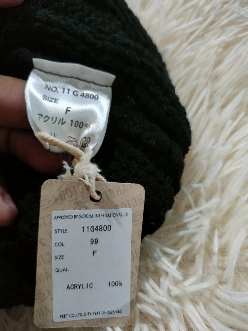 Gotcha Black Cable Knit Beanie (Category: Beanies) located in Abucay. Submitted by naixrazion199x (Listing ID 1465709421, Image 2). Description: - Brand: Gotcha - Color: Black - Style: Cable knit beanie with front fold and embroidered logo patch - Size: One size fits all - Material: 100% acrylic - Condition: Brand new with original tags attached.