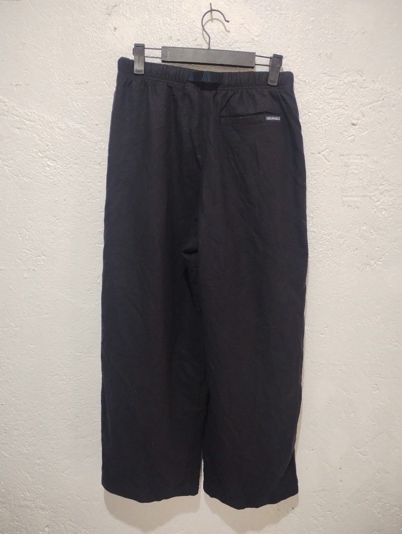 Gramicci baggy pants (Category: Jeans) located in Imus. Submitted by darylg88358770 (Listing ID 1465597548, Image 3). Description: - Brand/Model: Gramicci Black Climbing Pants (GLP-16F121) - Size: F tag (Relaxed, wide-leg fit) - Material: Premium wool blend exterior with smooth polyester lining - Features: Built-in adjustable webbing belt with buckle - Details: Back pocket with iconic Gramicci logo tag - Condition/Use: Great for outdoor activitie
