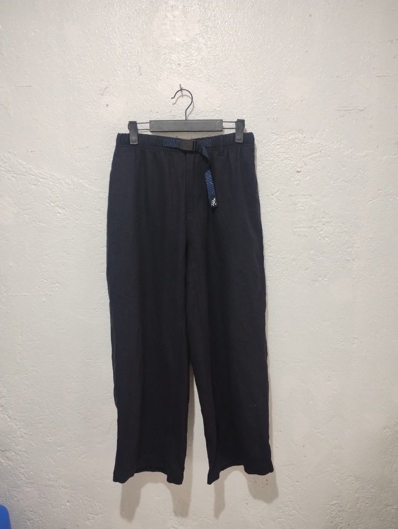 Gramicci baggy pants (Category: Jeans) located in Imus. Submitted by darylg88358770 (Listing ID 1465597548, Image 2). Description: - Brand/Model: Gramicci Black Climbing Pants (GLP-16F121) - Size: F tag (Relaxed, wide-leg fit) - Material: Premium wool blend exterior with smooth polyester lining - Features: Built-in adjustable webbing belt with buckle - Details: Back pocket with iconic Gramicci logo tag - Condition/Use: Great for outdoor activitie