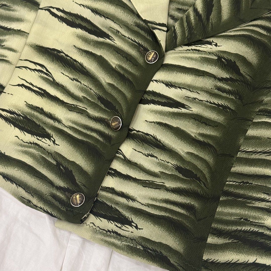 Green Tiger Vest Top (Category: Sleeveless) located in Quezon City. Submitted by va_v2 (Listing ID 1465624822, Image 2). Description: .