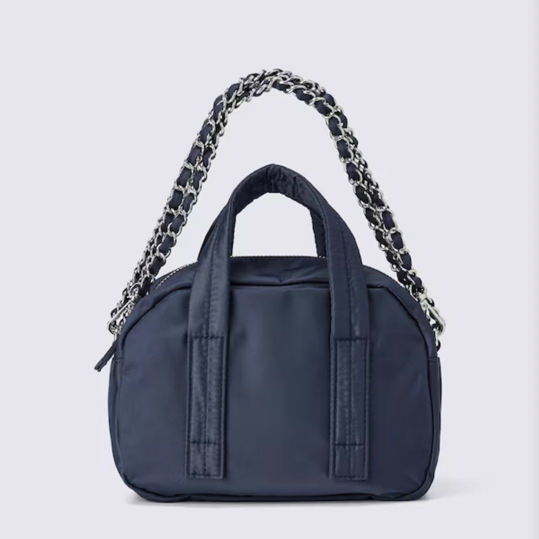 GU Nylon Mini Boston Bag (Category: Luxury Bags & Wallets) located in Quezon City. Submitted by fchescan (Listing ID 1465627178, Image 3). Description: - GU Nylon Mini Boston Bag - Compact design with dual top handles GU Nylon Mini Boston Bag in Black, Blue & Red from Japan 🇯🇵 Brand new w tag eta to ph: Oct 6 Loc: Commonwealth QC.