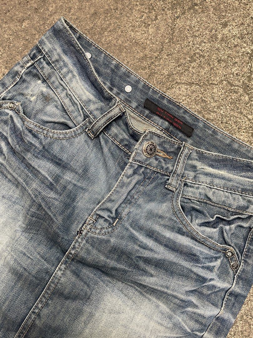 GU TIAN SEN Denim Mini Skirt (Category: Skirts) located in Davao. Submitted by riab_qt (Listing ID 1465592407, Image 2). Description: - SIZE: 27” LENGTH: 16” - Brand: GU TIAN SEN - Style: Classic Y2K low-rise light wash denim skirt - Details: Whiskering and fading throughout for a vintage look - Closure & Fit: Front button closure with belt loops - Pockets: Two front pockets and two back flap pockets with button details - Condition: Raw finish on