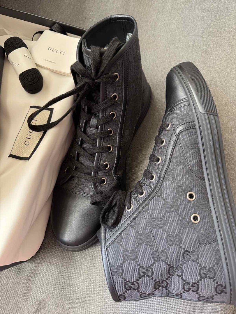 Gucci Black GG Monogram High-Top Sneakers (Category: Sneakers & Footwear) located in Manila. Submitted by carolynba49610 (Listing ID 1465604965, Image 3). Description: Gucci high-top sneakers in black GG monogram canvas and leather trim. Classic lace-up front with metal eyelets. Textured rubber sole with debossed Gucci script underneath. Includes the original branded box, dust bag, spare black laces, and care booklet. Clean condition overall, rea