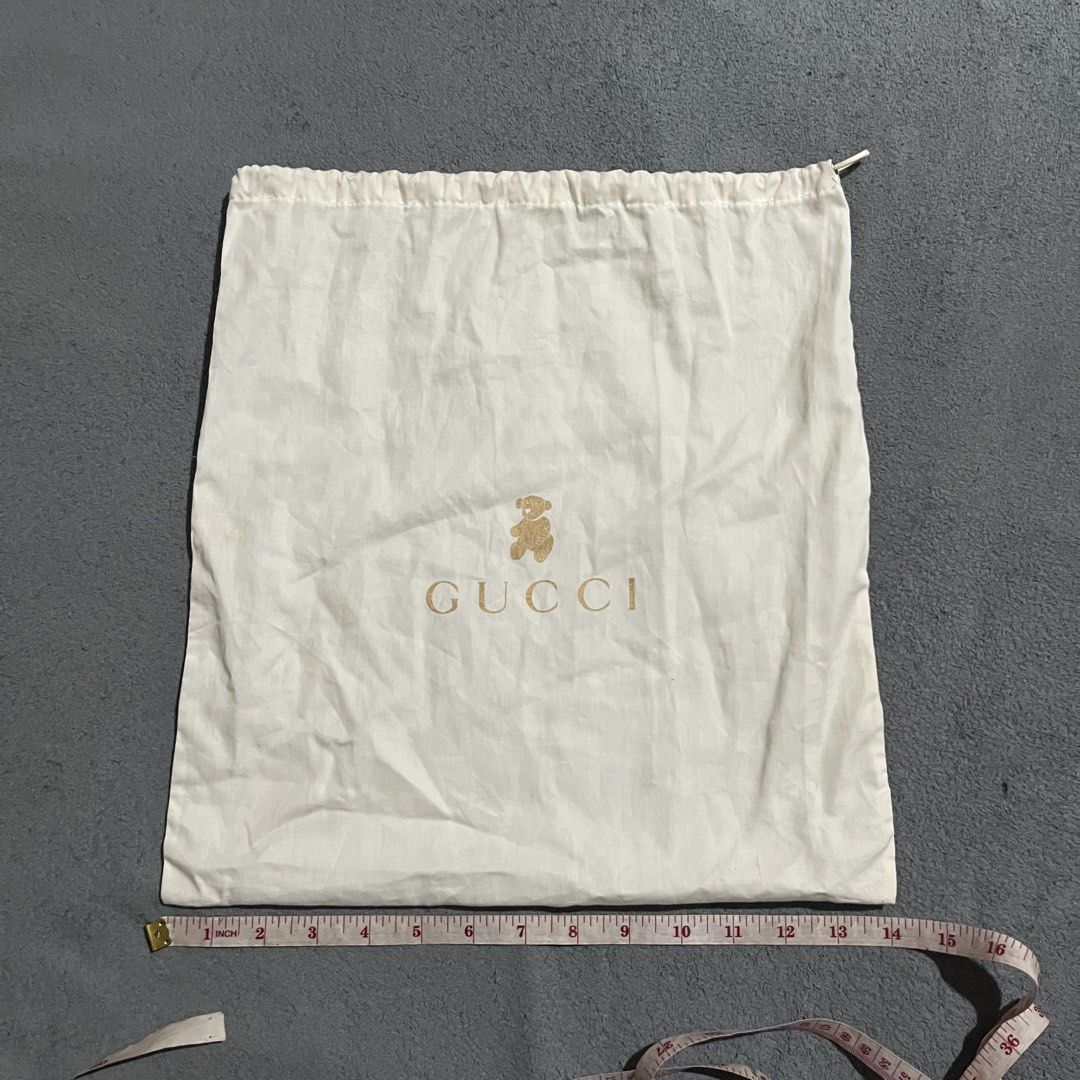 Gucci Drawstring Dust Bag (Category: Luxury Bags & Wallets) located in Hagonoy. Submitted by ianthrift_ph (Listing ID 1465716095, Image 2). Description: (see detailed picture for size) pristine condition no holes issue: minor stain (washable).