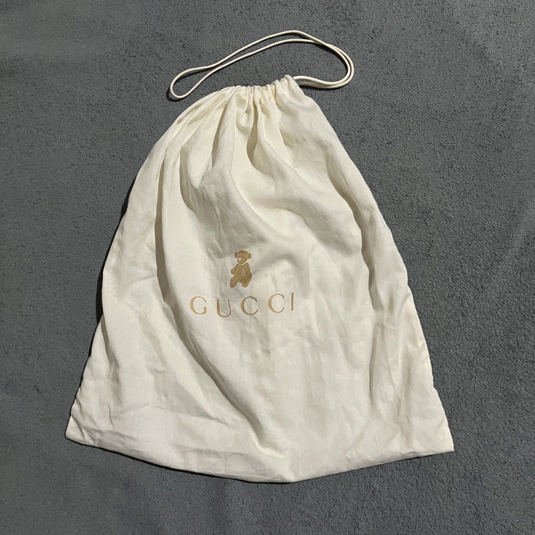Gucci Drawstring Dust Bag (Category: Luxury Bags & Wallets) located in Hagonoy. Submitted by ianthrift_ph (Listing ID 1465716095, Image 1). Description: (see detailed picture for size) pristine condition no holes issue: minor stain (washable).