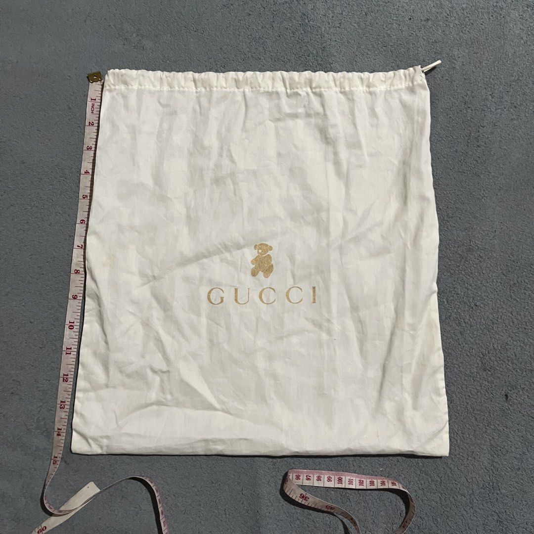 Gucci Drawstring Dust Bag (Category: Luxury Bags & Wallets) located in Hagonoy. Submitted by ianthrift_ph (Listing ID 1465716095, Image 3). Description: (see detailed picture for size) pristine condition no holes issue: minor stain (washable).