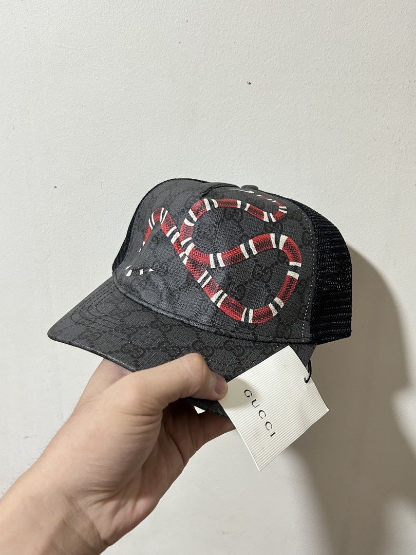 Gucci Kingsnake Cap (Category: Caps & Hats) located in Manila. Submitted by blessed.drei (Listing ID 1465711226, Image 1). Description: Brandnew with Hangtag Included Adjustable Strap No Issues ₱250 + Shipping 📍 Deca Homes, Manila.
