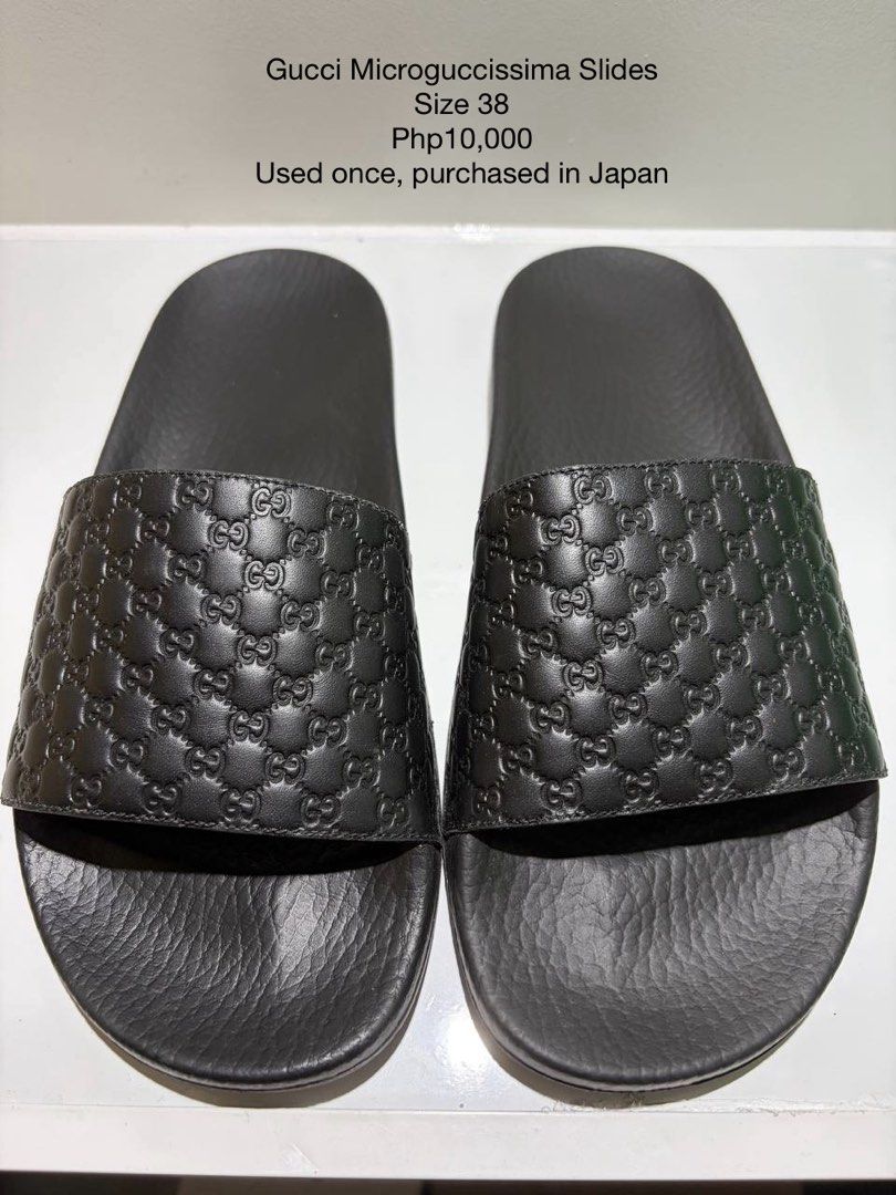 Gucci Microguccissima Slides Size 38 (Category: Sneakers & Footwear) located in Bacoor. Submitted by tin.teodosio (Listing ID 1465619065, Image 1). Description: - Brand: Gucci - Item: Microguccissima Slides - Color: Black Leather - Size: 38 - Design: All-over debossed monogram pattern - Origin: Purchased in Japan - Condition: Worn only once, practically brand new with zero visible wear on soles and uppers.