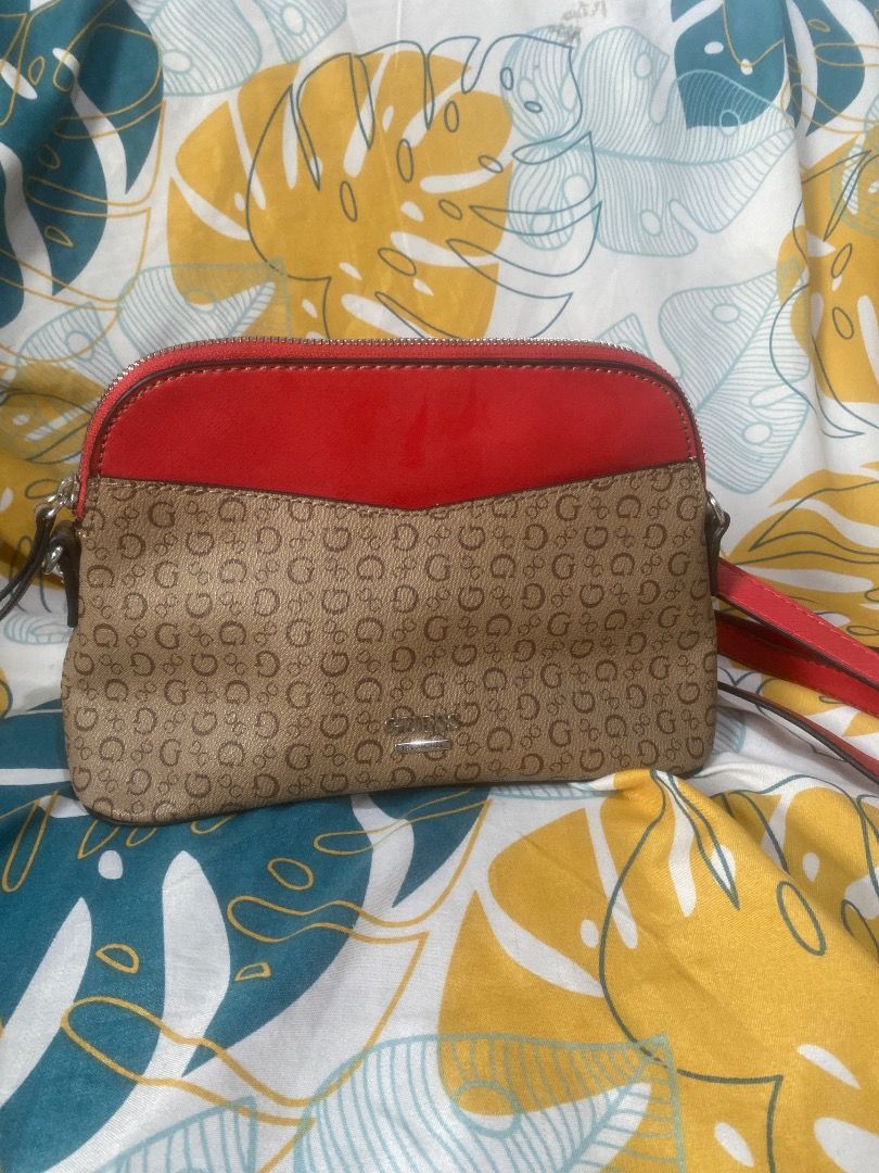 GUESS monogram crossbody bag (Category: Cross-body Bags) located in Manila. Submitted by noblehorse.b03e21 (Listing ID 1465653982, Image 1). Description: .