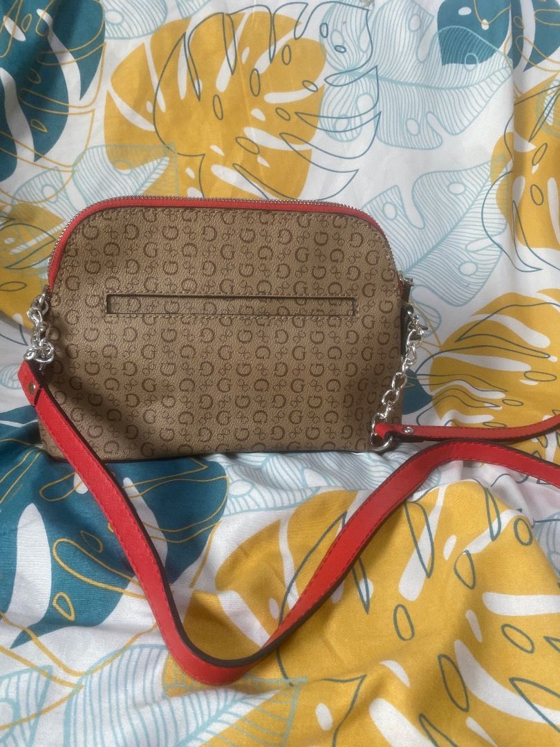 GUESS monogram crossbody bag (Category: Cross-body Bags) located in Manila. Submitted by noblehorse.b03e21 (Listing ID 1465653982, Image 3). Description: .