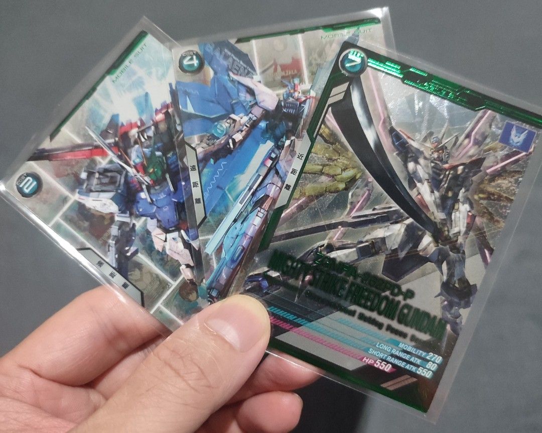 Gundam Assemble Base (10 pcs.) (Category: Raw Singles) located in Paranaque City. Submitted by otakumeisters (Listing ID 1465752181, Image 3). Description: ❗Take all 10 cards for 500 php ❗No breaking of set ❗Price is firm/ No last price ❗Payment: Gcash/BPI ❗Delivery: Lalamove/LBC (buyer's expense) ❗Location: Parañaque.