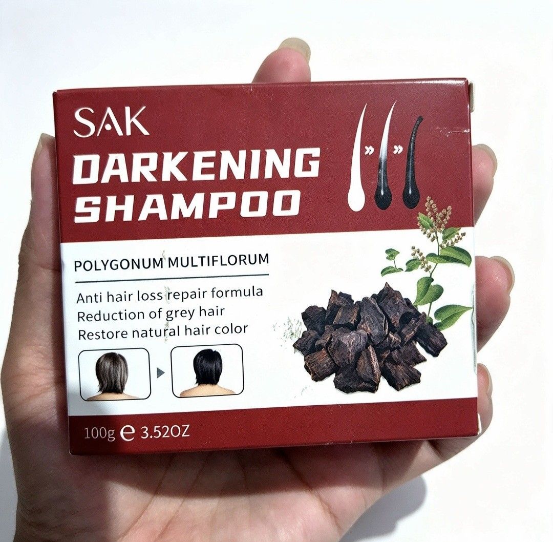 Hair Darkening Shampoo Polygonum (Category: Hair) located in Quezon City. Submitted by ana-chan (Listing ID 1465699973, Image 1). Description: - Product: SAK Darkening Shampoo Bar - Net Weight: 100g / 3.52OZ - Key Ingredient: Polygonum Multiflorum - Benefits: Reduces grey hair, fights hair loss, and restores natural hair color - Condition: Brand new, sealed in original red box packaging - Manufacture Date: August 23, 2025 - Expiry Date: August 22