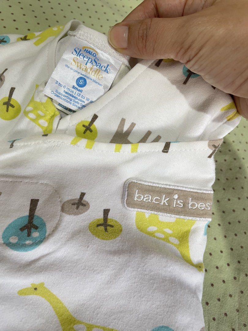 HALO SleepSack Swaddle 3-Pack Size S (Category: Babies & Kids Fashion) located in San Jose del Monte. Submitted by momma_buys (Listing ID 1465598336, Image 3). Description: - Brand: HALO SleepSack Swaddles - Size: Small (fits 3-6 months, 13-18 lbs) - Set of 2: One white cotton (giraffe and tree print) and one blue fleece swaddle - Adjustable wings for a secure, custom fit - Convenient bottom zipper for hassle-free diaper changes - Embroidered 'ba