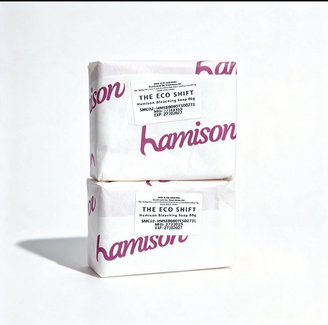 Hamison Bleaching Soap Face and Body 2pcs ecoshift (Category: Bath) located in Quezon City. Submitted by ana-chan (Listing ID 1465678103, Image 2). Description: Two bars of Hamison Bleaching Soap from The Eco Shift. Each bar is 80 grams, designed for face and body use. White paper packaging with pink branding. Manufacture date October 27, 2025, expiration date October 27, 2027. Unopened and unused condition..