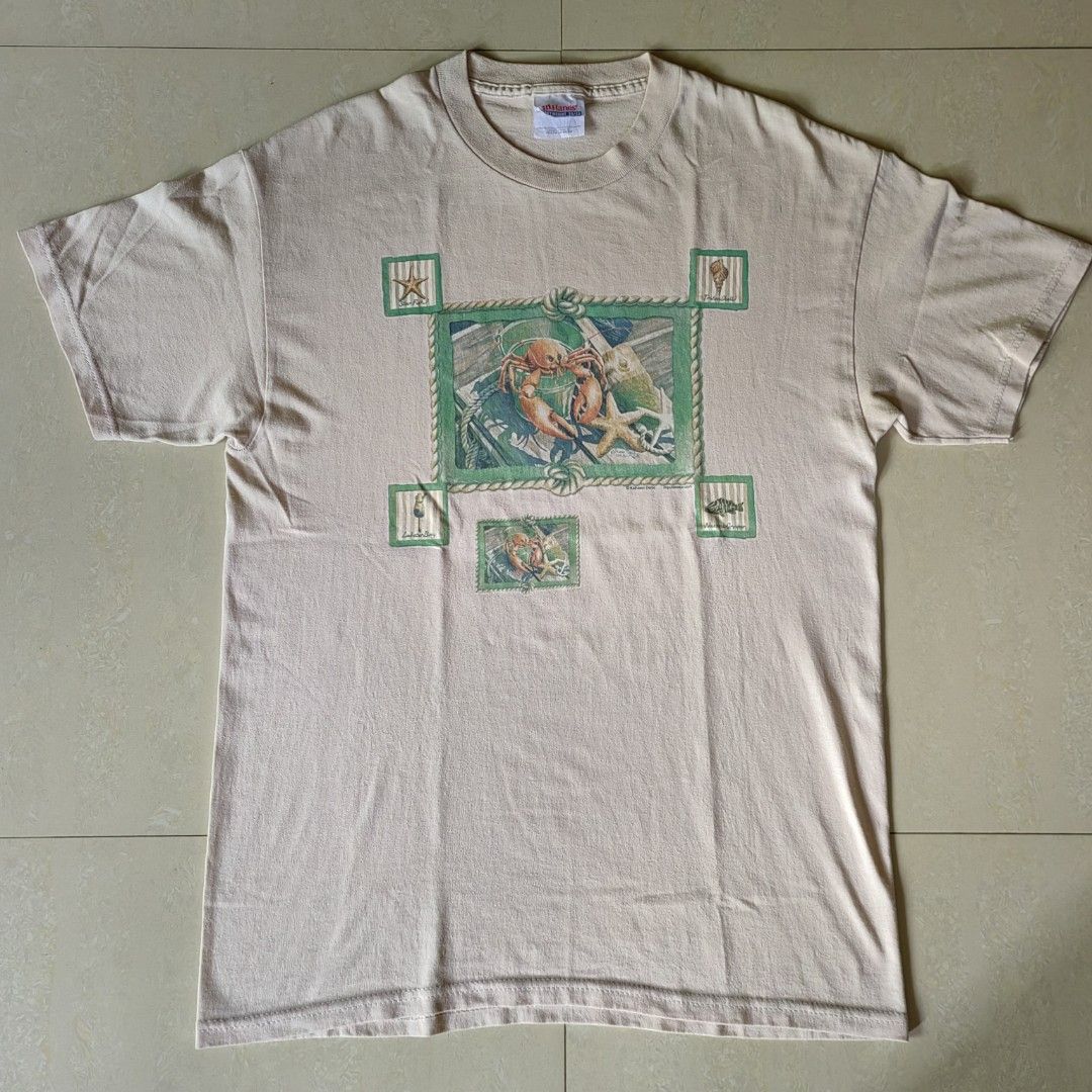 HANES graphic print shirt (Category: Tshirts & Polo Shirts ) located in Barotac Nuevo. Submitted by yorcollections (Listing ID 1465598424, Image 1). Description: HANES graphic print shirt Size M on tag Actual Dimensions Length 28 inches Width 19 inches Issue: dot stain see pics 100 + sf.