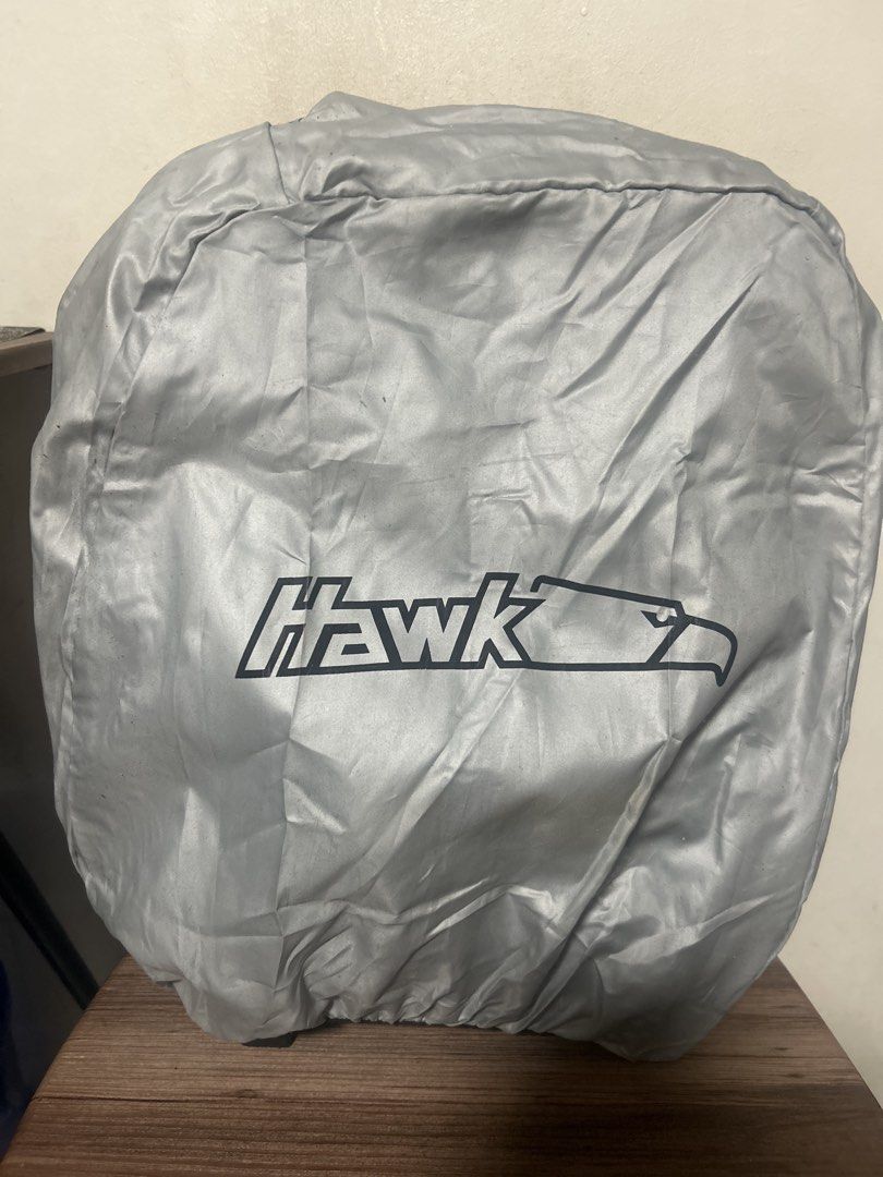 Hawk Rolling Backpack with Rain Cover (Category: Backpacks) located in Manila. Submitted by thrift_items_need (Listing ID 1465621524, Image 1). Description: - Brand: Hawk - Color: Black - Type: Roller backpack with telescoping handle and smooth-rolling wheels - Features: Multiple compartments, front pockets, and tuck-away back straps for versatility - Freebie: Matching silver rain cover with Hawk logo included - Condition: Used, with minor dust o