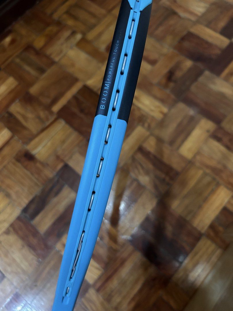 Head Boom MP Tennis Racket Blue (Category: Racket and Ball Sports) located in Mandaluyong City. Submitted by chickeemeily (Listing ID 1465601088, Image 3). Description: - Model: Head Boom MP (Light Blue / Black) - Head Size: 645 sq cm / 100 sq in - Unstrung Weight: 295g / 10.4 oz - Balance: 315 mm / 1 inch head light - Freebies included: White overgrip wrapped on handle + dampener - Condition: with visible scuffs .