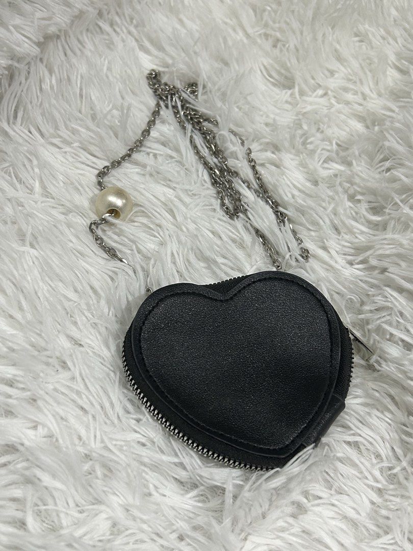 Heart sling Coin purse (Category: Purses & Pouches) located in Pasig City. Submitted by minminreyn (Listing ID 1465601180, Image 1). Description: Heart Sling Coin Purse Preloved Condition Cavite or Qc.