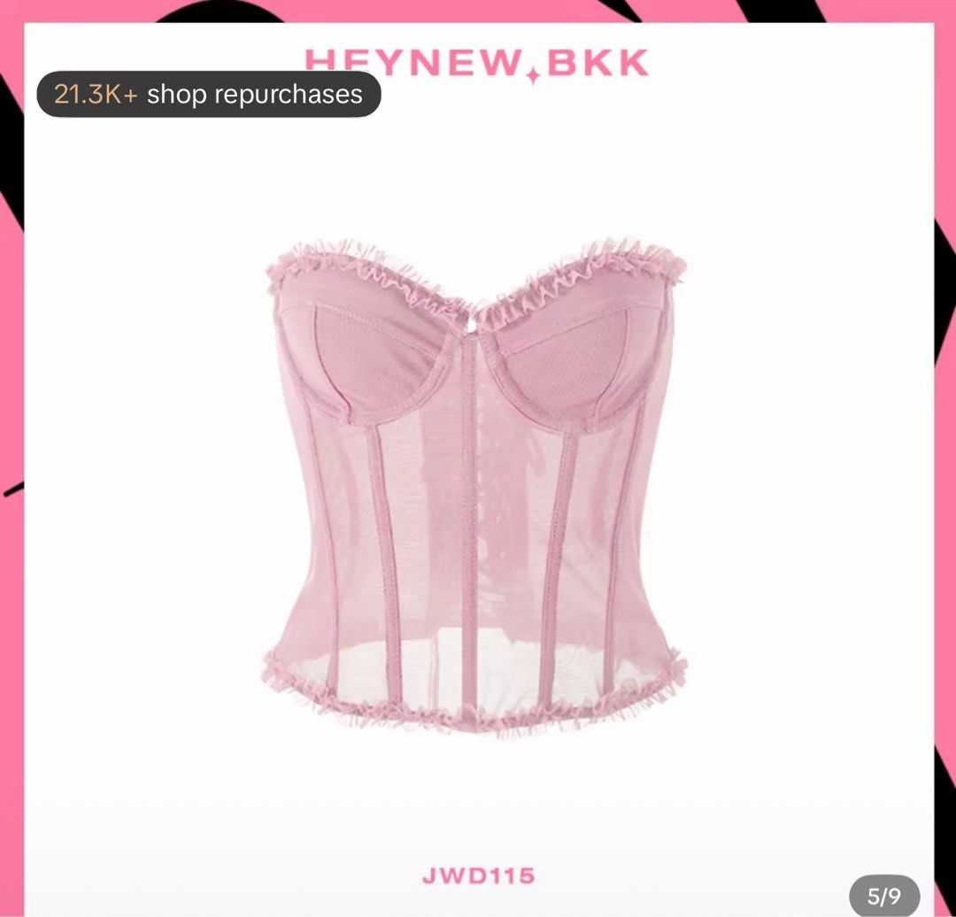 heynew.bkk Pink Mesh Corset (Category: Sleeveless) located in Muntinlupa City. Submitted by angeliqvn (Listing ID 1465738229, Image 1). Description: - Brand/Style: HEYNEW.BKK (Style JWD115) - Color/Material: Pink sheer mesh, lightweight and breathable - Design: Structured boning, sweetheart neckline with ruffled trim - Closure: Hook-and-eye front with an adjustable lace-up back - Styling: Versatile piece, great for layering or wearing on its own.