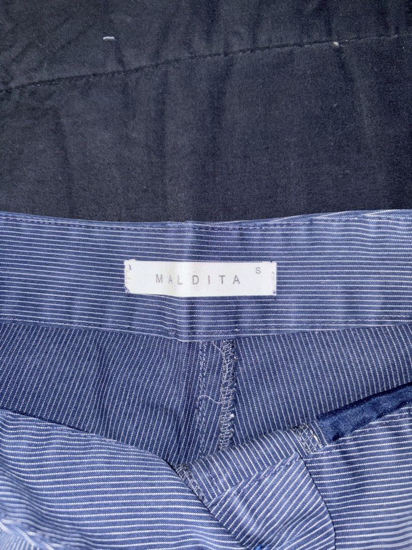 High Waisted Shorts (Category: Shorts) located in Quezon City. Submitted by katedeclutter (Listing ID 1465594038, Image 2). Description: - Brand: Maldita - Size: Small - Color: Blue with thin white vertical stripes - Fit: High-waisted - Details: Single front button closure, zipper fly, and standard side pockets - Condition: Crisp fabric with clean stitching, great for warm weather.