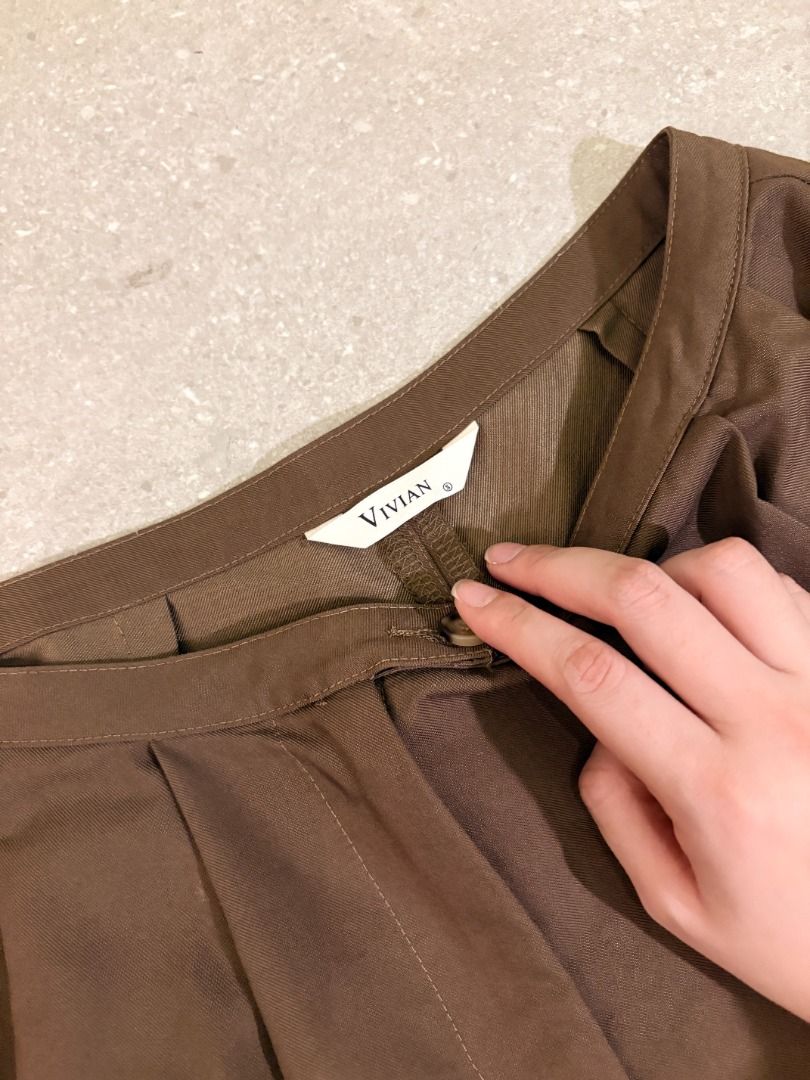 High-waisted Pants (Long length) (Category: Trousers) located in Manila. Submitted by mellow_mango (Listing ID 1465702284, Image 3). Description: - Bought in Bangkok - Style: High-waisted wide-leg trousers with front pleats - Color: Rich earth-tone brown - Material: Lightweight, smooth drape for all-day comfort - Versatility: Perfect basic piece for workwear or casual styling - Condition: Good Condition - Mode of Payment: GCash, Maya.