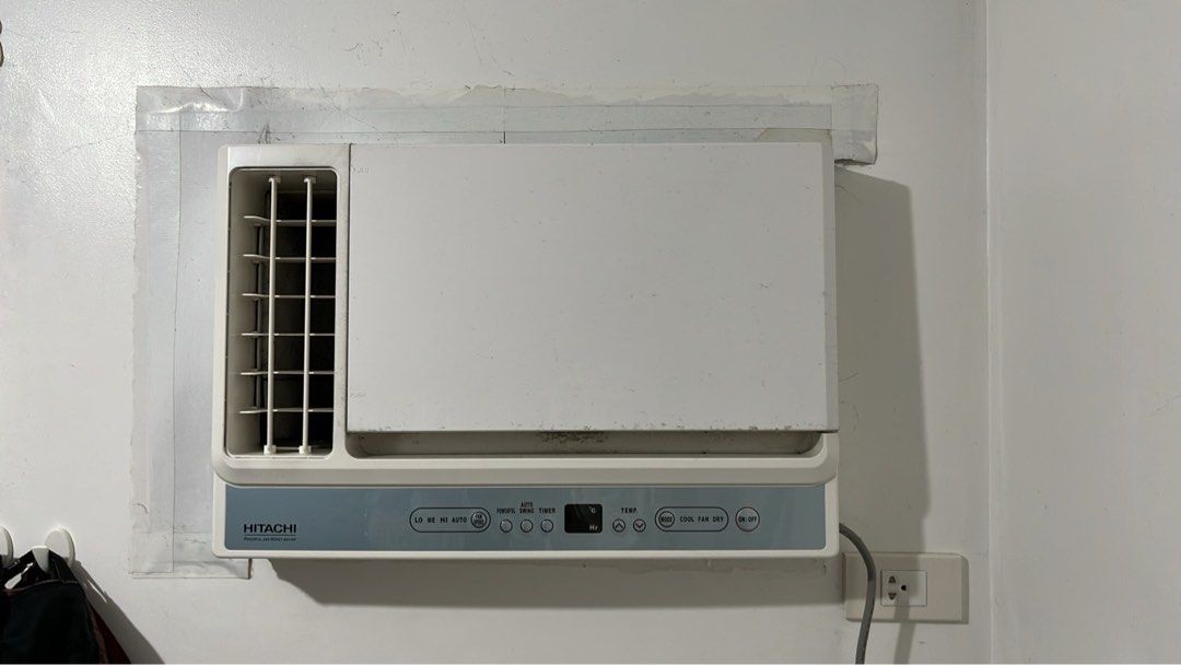 Hitachi Window Type Air Conditioner (Category: Air Conditioning and Heating) located in Muntinlupa City. Submitted by trismerigold (Listing ID 1465681162, Image 1). Description: - Brand: Hitachi window type air conditioner - Color: White with blue control panel - Features: Digital temperature display, fan speed settings, auto swing, and timer buttons - Condition: Fully functional and ready for use - Pickup: Available for pickup.
