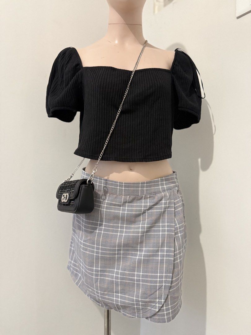 H&M Black Ribbed Puff Sleeve Crop Top (Category: Shirts) located in Cebu City. Submitted by cleverstorm.f1a902 (Listing ID 1465742400, Image 2). Description: - Brand: H&M - Size: Large - Material: Stretchy ribbed knit fabric - Design: Square neckline with short puff sleeves - Fit: Cropped - Condition: Clean and ready to wear - Styling: Pairs effortlessly with high-waisted skirts or jeans.