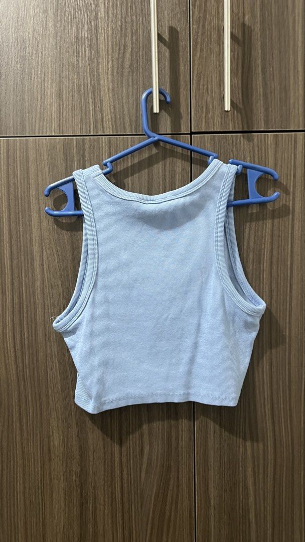 H&M Blue Ribbed Crop Tank Top Size M (Category: Sleeveless) located in Taguig. Submitted by orangeismycat (Listing ID 1465628653, Image 3). Description: - Used only once! - RFS: Too many clothes - Brand: H&M - Item: Ribbed crop top - Color: Light blue - Size: Medium - Style: Classic scoop neck tank - Fit: Snug with comfortable stretch - Condition: Excellent, worn only a couple of times Tags: Zara Love Bonito Uniqlo H&M Forever 21.