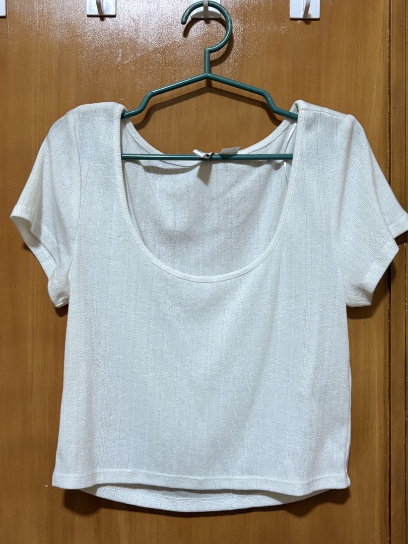 H&M Divided White Ribbed Scoop Neck Top Size L (Category: Shirts) located in Mandaue City. Submitted by klosetfindscebu (Listing ID 1465660837, Image 1). Description: - Brand: H&M Divided - Size: L - Color: White - Style: Short sleeve ribbed top with wide scoop neckline - Material: Textured fabric - Condition: Good basic piece, versatile for everyday wear.