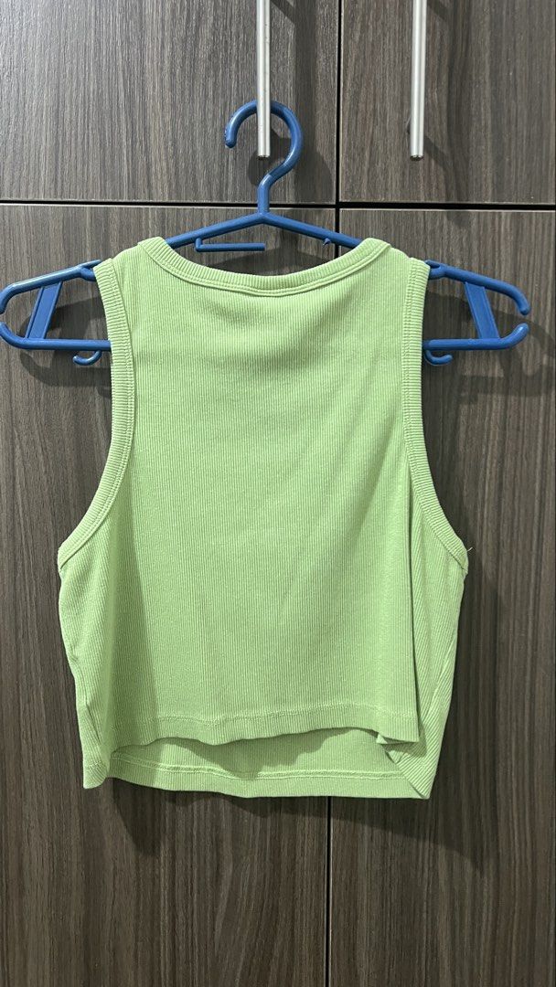 H&M Green Ribbed Crop Top Size M (Category: Sleeveless) located in Taguig. Submitted by orangeismycat (Listing ID 1465629326, Image 3). Description: - Used only once! - RFS: Too many clothes - Brand: H&M - Item: Ribbed crop top - Color: Green - Neckline & Style: Round neck, sleeveless - Material: Soft cotton blend with stretch - Size: EUR M / US M / CN 165/96A - Condition: Worn a few times, great shape, clean and washed Tags: Zara Love Bonito Uni