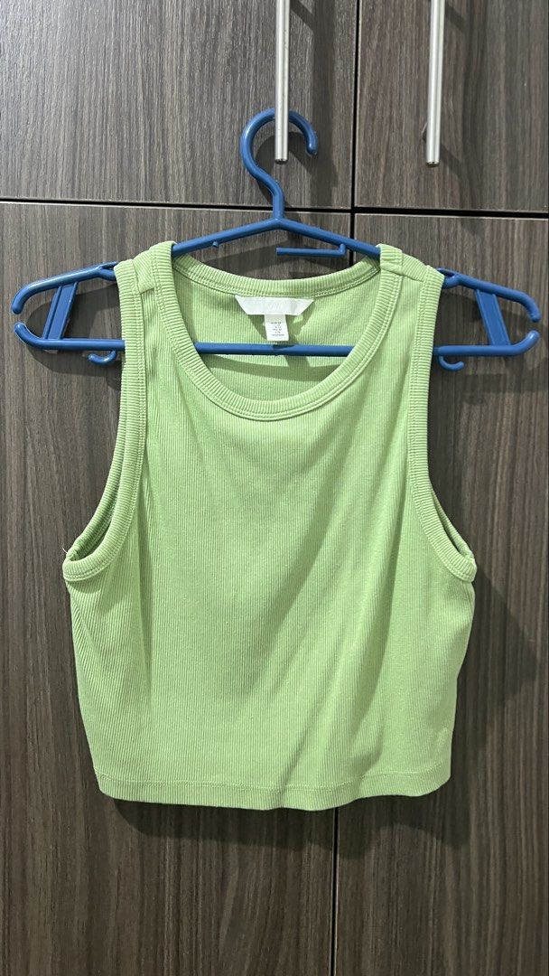 H&M Green Ribbed Crop Top Size M (Category: Sleeveless) located in Taguig. Submitted by orangeismycat (Listing ID 1465629326, Image 2). Description: - Used only once! - RFS: Too many clothes - Brand: H&M - Item: Ribbed crop top - Color: Green - Neckline & Style: Round neck, sleeveless - Material: Soft cotton blend with stretch - Size: EUR M / US M / CN 165/96A - Condition: Worn a few times, great shape, clean and washed Tags: Zara Love Bonito Uni