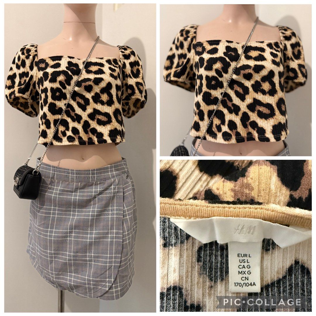 H&M Leopard Print Square Neck Puff Sleeve Top (Category: Blouses) located in Cebu City. Submitted by cleverstorm.f1a902 (Listing ID 1465742496, Image 1). Description: - Brand: H&M - Size: Large - Design: Leopard print crop top with trendy square neckline and short puff sleeves - Material: Ribbed knit with great stretch for a comfortable fit - Styling: Easily pairs with high-waisted skirts or jeans.