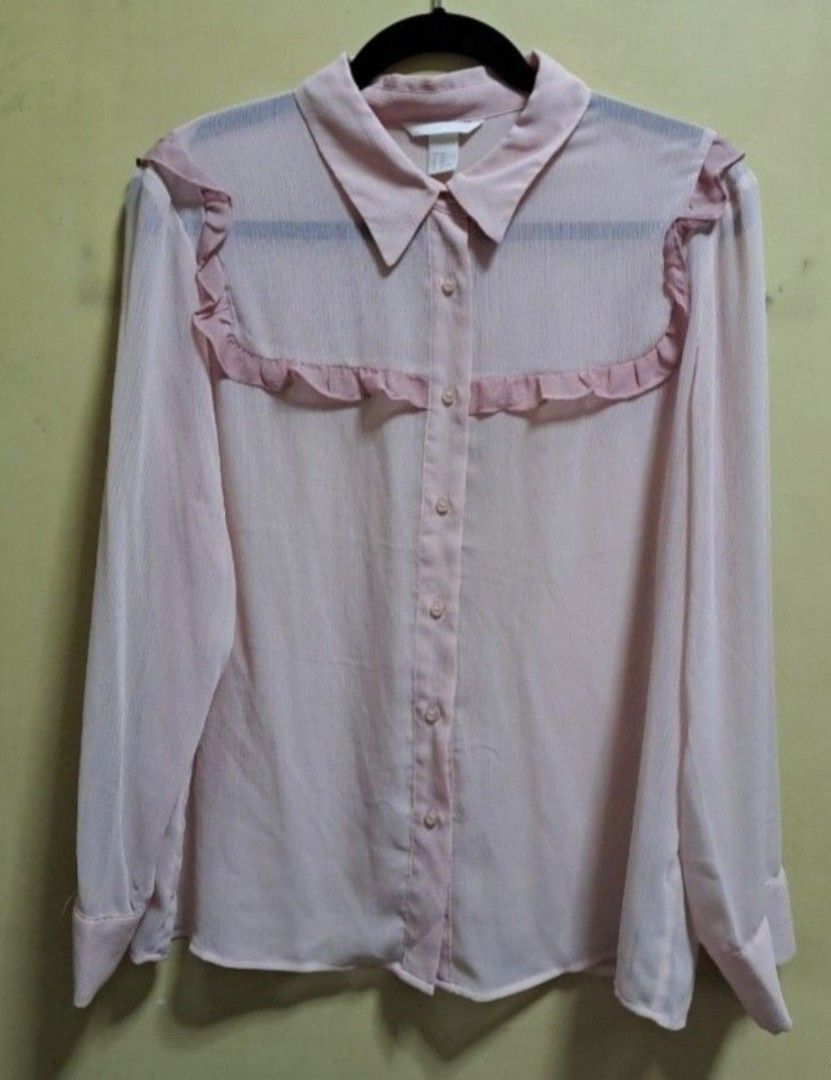 H&M Light Pink Sheer Blouse (Category: Blouses) located in Manila. Submitted by thrifter_lifestyle (Listing ID 1465691882, Image 1). Description: Brand: H&M Long-Sleeves Sheer light material, best to be worn with inner Photo of back included No issues, barely worn 😀 RFS: Shifted to WFH, no need for office/business clothes.