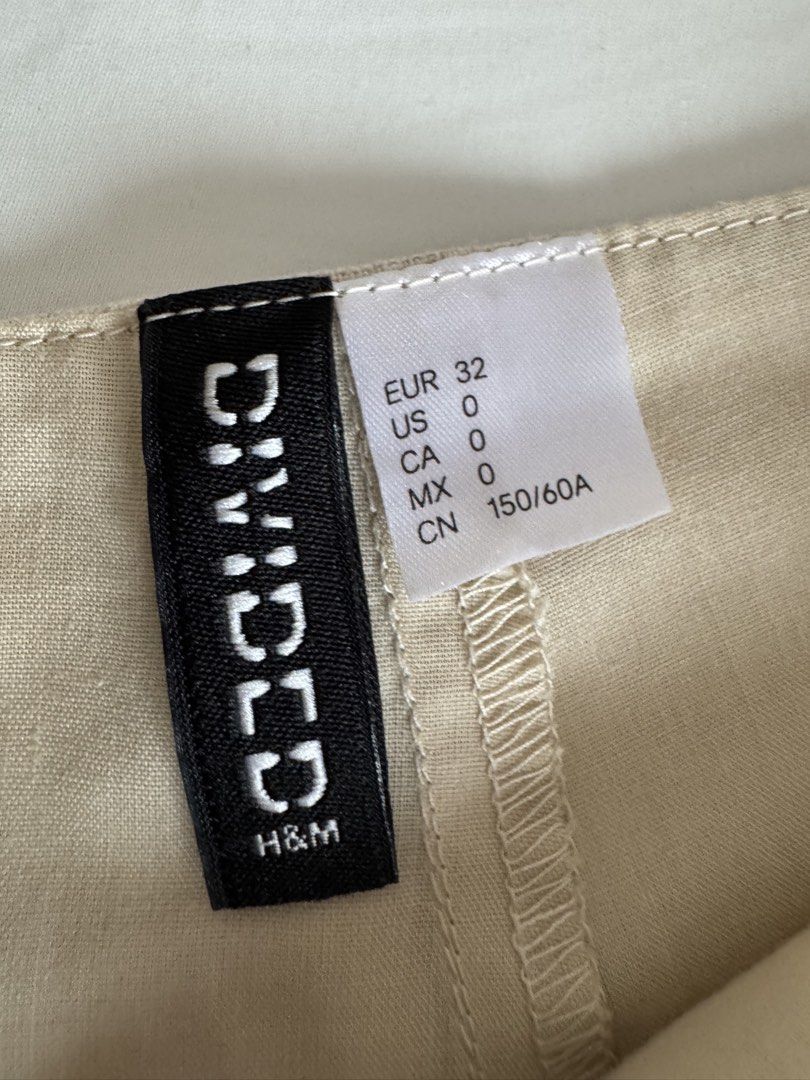 H&M Linen Mini Skirt (Category: Skirts) located in Cebu City. Submitted by gillie_ (Listing ID 1465590820, Image 2). Description: • BRAND NEW (No more price tag bc I thought I'd wear it but never did) • Fits size 22-23 • Length is actually mini • Comes with built-in undershorts.