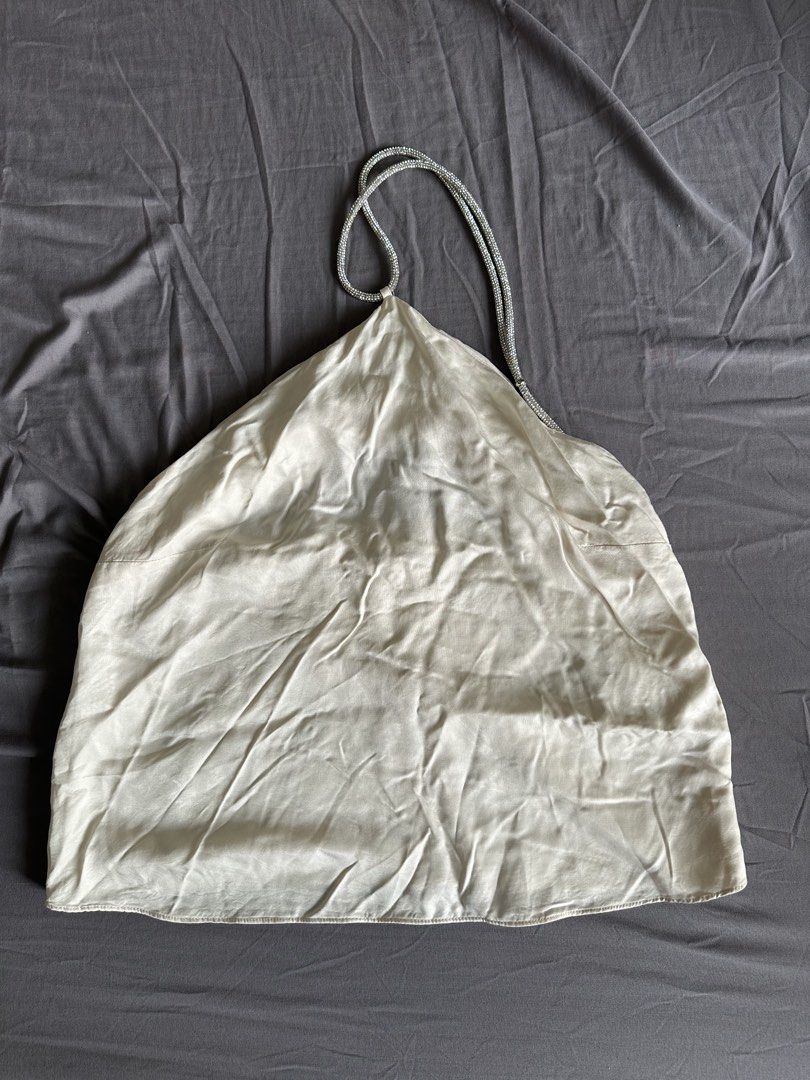 H&M White Satin Halter Top with Rhinestone Strap (Category: Sleeveless) located in Pasig City. Submitted by afterglowpreloved (Listing ID 1465596530, Image 1). Description: .