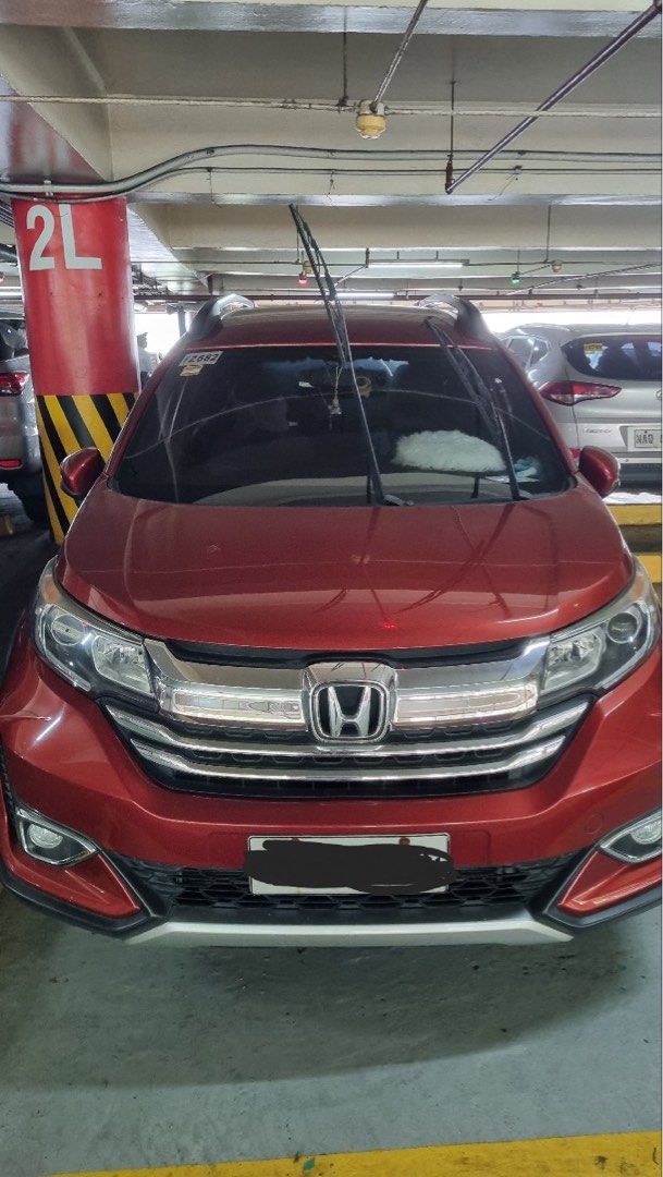 Honda BR-V (Category: Used Cars) located in Quezon City. Submitted by ysaysay (Listing ID 1465751856, Image 1). Description: 18kph 1st owner Complete documents Negotiable .