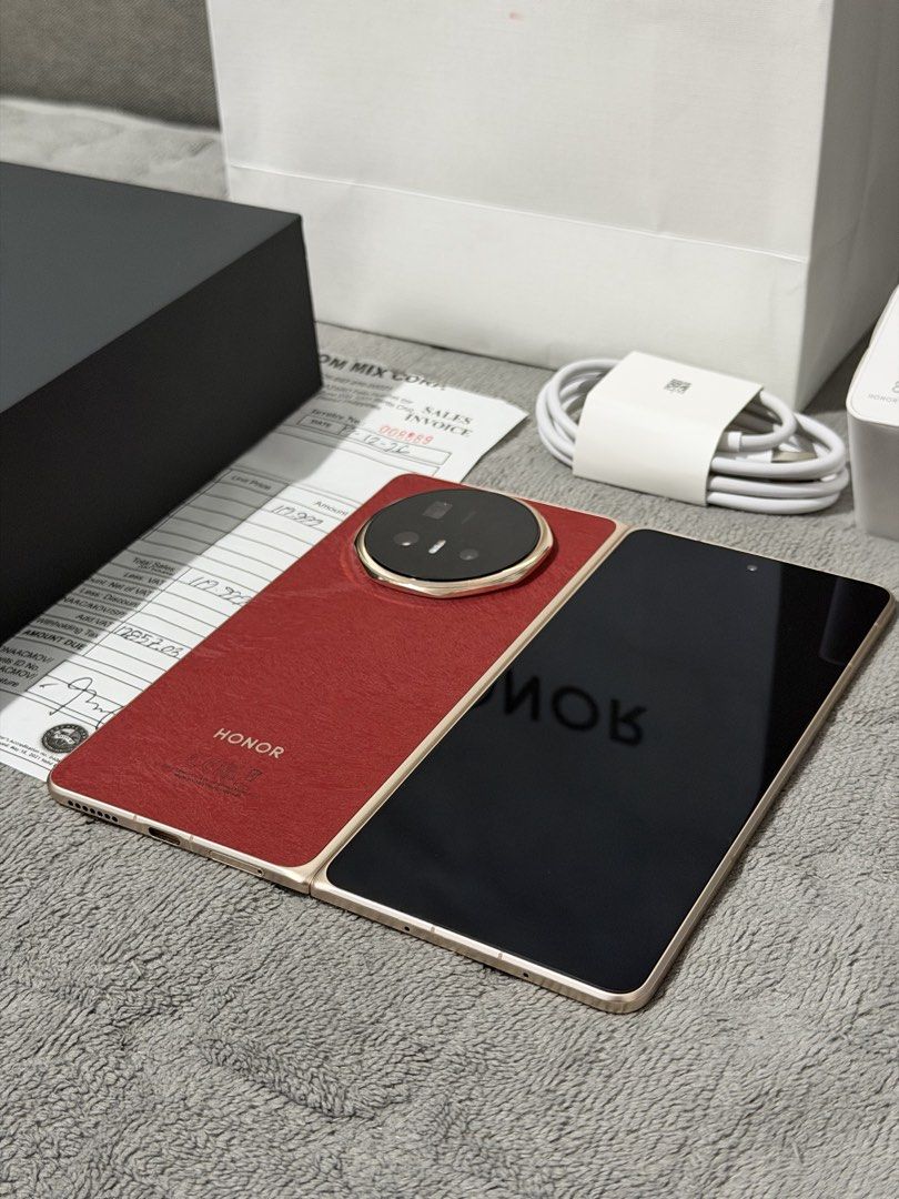 Honor Magic V6 512gb red with receipt from physical store (Category: Android Others) located in Manila. Submitted by primonching (Listing ID 1465689052, Image 3). Description: For sale Honor Magic V6 512gb red with receipt from honor physical store good as new 100% smooth. Complete standard package Bought it for 120k. Selling it for only 105k negotiable. Manila..