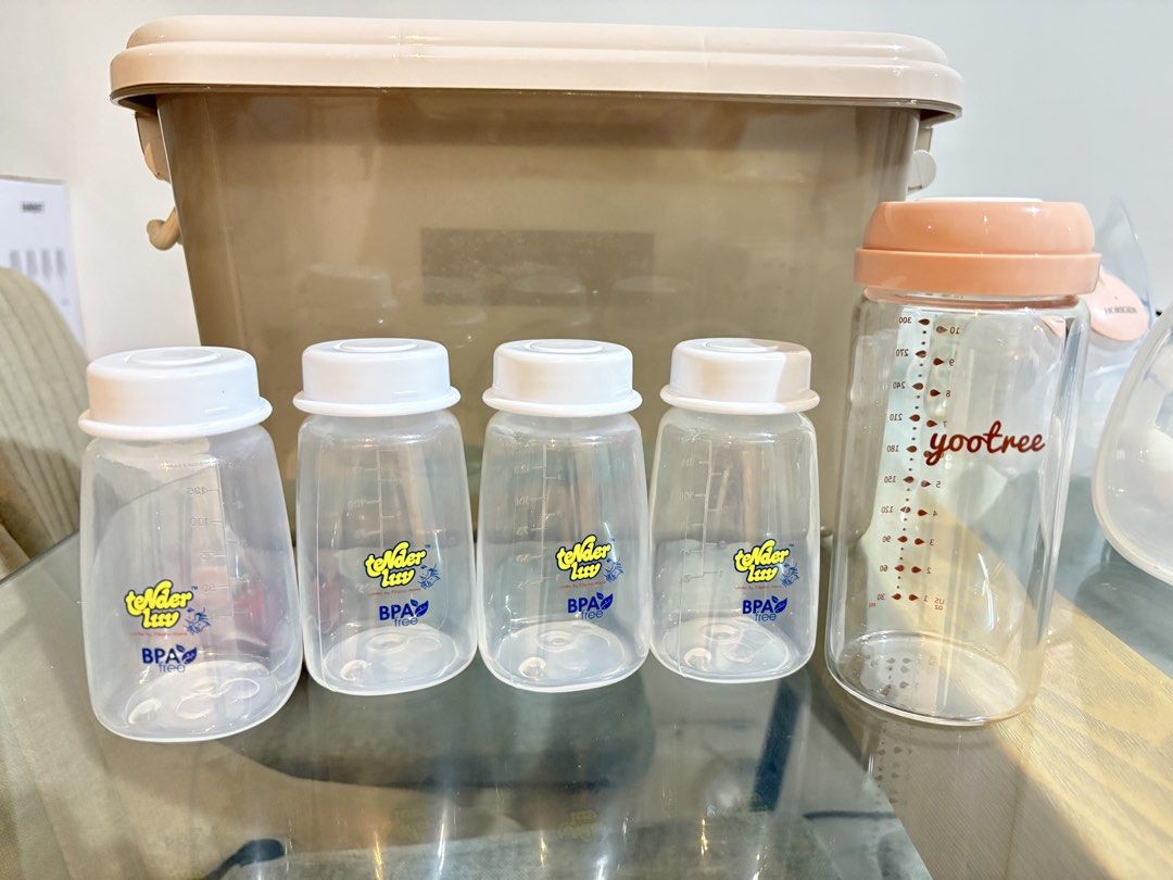 Horigen Double Breast Pump Set with dr.isla Flange Inserts and Bottles (Category: Breastfeeding & Bottle Feeding) located in Bacoor. Submitted by hershanenicolas (Listing ID 1465600584, Image 3). Description: - Horigen electric double breast pump with pink motor units and tubing - Dr.Isla box of flange inserts (Model CH12, 12 pieces in 6 sizes) - 4 Tender Luv BPA-free bottles with white caps - 1 tall Yootree bottle with peach lid - 2 manual silic