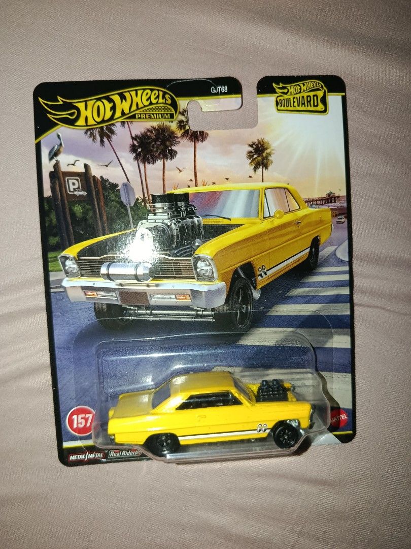 Hotwheels premium collection (Category: Vehicle & Diecast Models) located in Mandaluyong City. Submitted by kloud_official (Listing ID 1465628929, Image 2). Description: FROM PERSONAL COLLECTION Datsun — ₱750 Super Nova — ₱700 El Camino — ₱700 Aston Martin DBS — ₱700 Jeepster — ₱700 Total asking: ₱3,400.