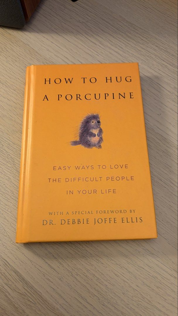 How to Hug a Porcupine (Category: Storybooks) located in Pasay City. Submitted by sevnco (Listing ID 1465754701, Image 1). Description: - Title: How to Hug a Porcupine: Easy Ways to Love the Difficult People in Your Life - Publisher: Hatherleigh Press - Special Feature: Includes foreword by Dr. Debbie Joffe Ellis - Format: Hardcover with striking orange cover - Condition Note: Original Fully Booked retail price sticker still attached on the back 