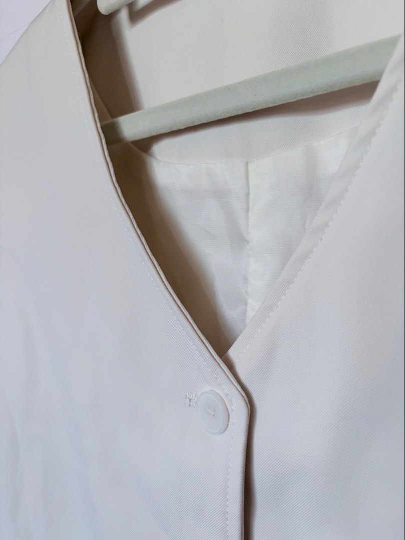 HQ Cream V-neck Suit Vest (Category: Others Tops) located in Tayug. Submitted by deklutter_ (Listing ID 1465583102, Image 2). Description: GANDA irl Cotton twill fabric, with lining for comfort Can fit medium to semi large Bust upto 37 in Length 19 in (back part) No issues ‼️Pls haggle responsibly. All items are priced according to their overall condition..