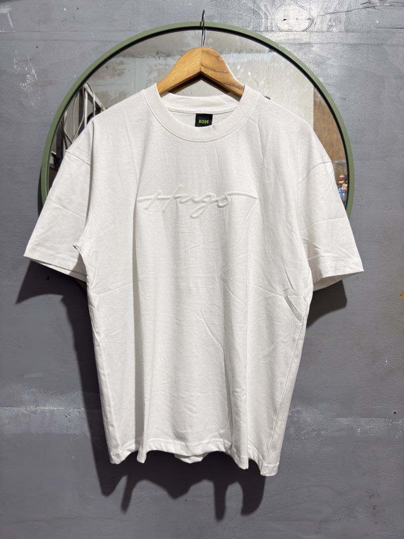 HUGO BOSS Rubber Loggo (Category: Formal Shirts) located in Manila. Submitted by tindero-ng-damit (Listing ID 1465686044, Image 1). Description: Hugo Boss Embossed Rubber Logo Size L best fit 22 width - 28 Length No issue - Flawless Complete tags.