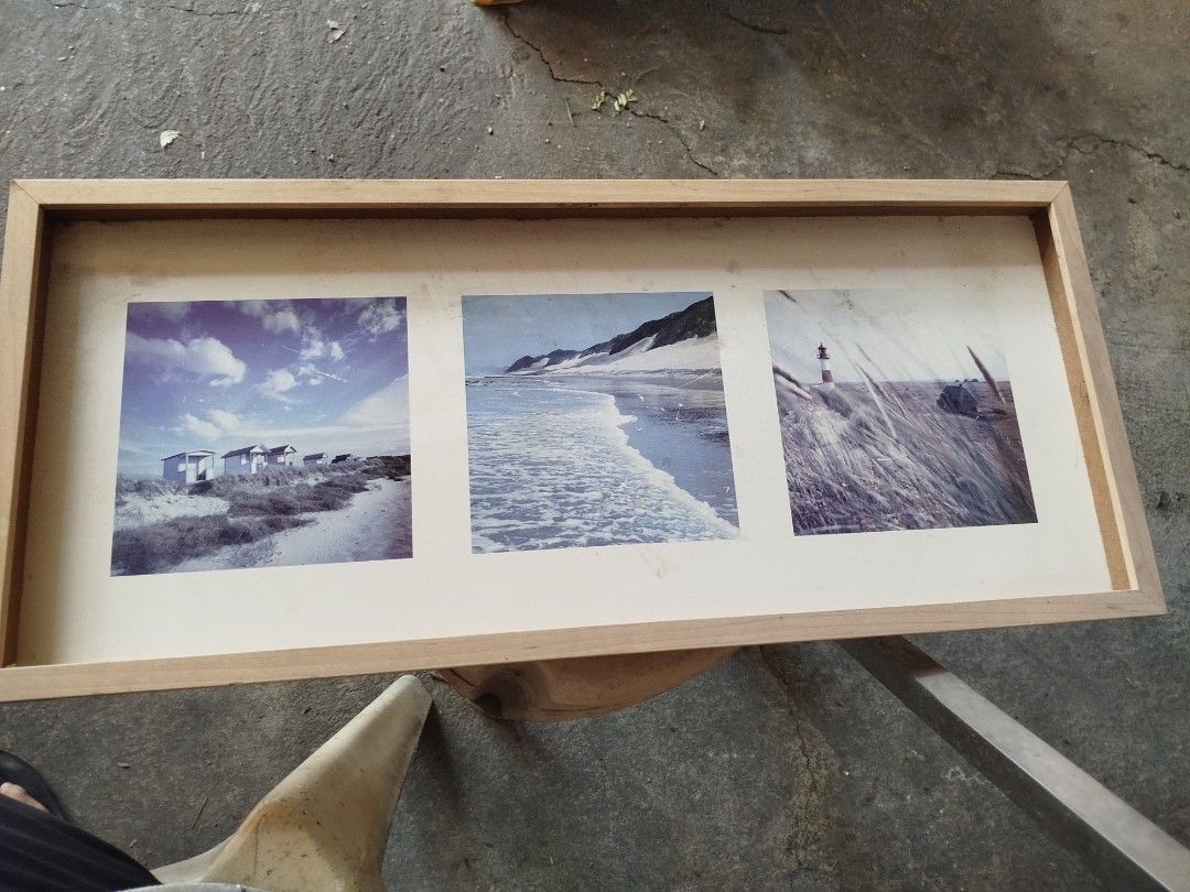 IKEA ERIKSLUND Triptych Picture Frame 72x32cm (Category: Frames & Pictures) located in Pasig City. Submitted by qwerty1026 (Listing ID 1465674053, Image 1). Description: IKEA ERIKSLUND Triptych Picture Frame 72x32cm — ₱500 Selling an IKEA ERIKSLUND horizontal triptych photo frame in natural birch wood finish — 72x32cm. Fits three photos side by side, perfect for living room, bedroom, or home office display. Comes with the original seaside/coastal