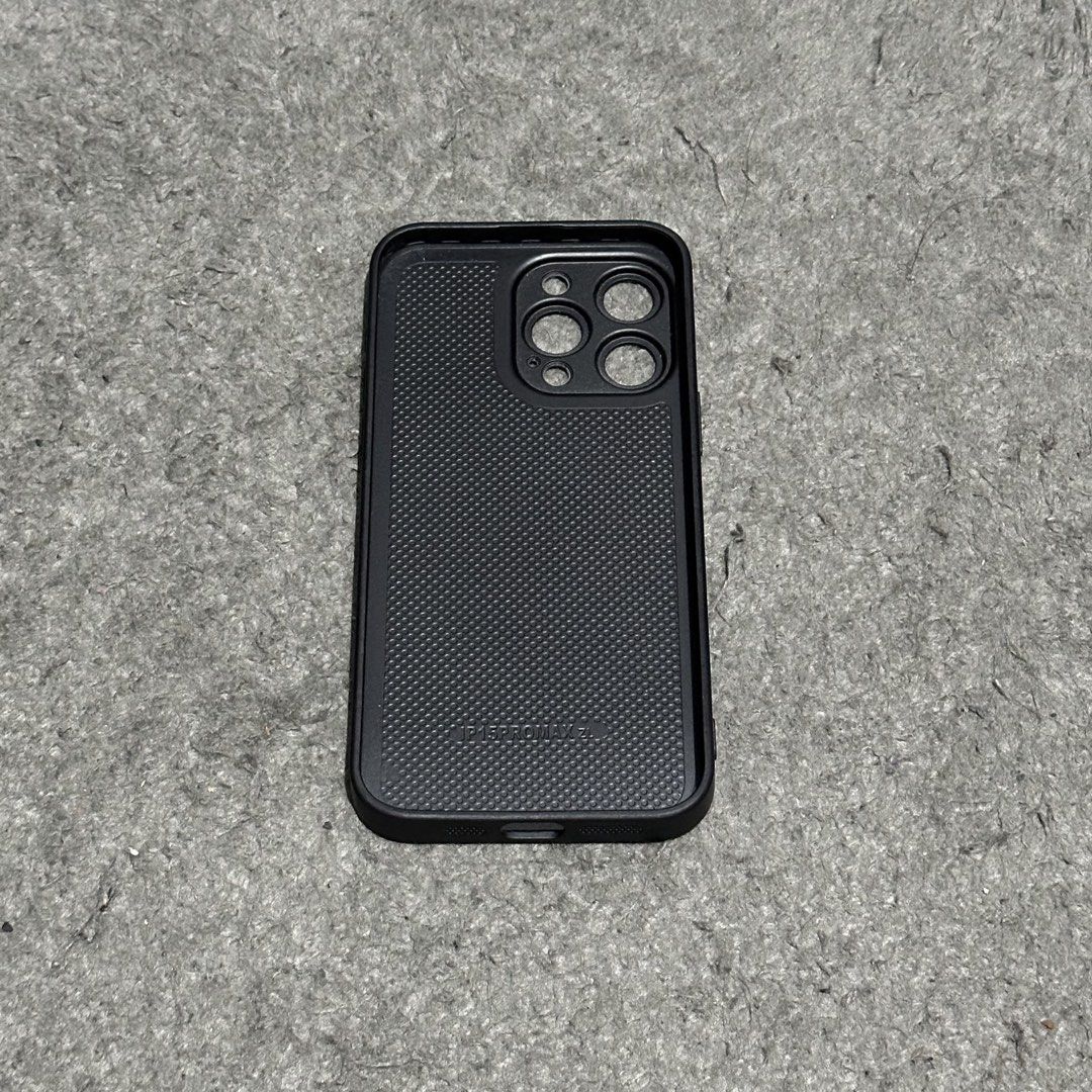 Iphone 15 Pro Max Phone Case (Category: Cases & Sleeves) located in Lipa City. Submitted by jecoparra (Listing ID 1465703011, Image 3). Description: - Compatible Model: iPhone 15 Pro Max - Color: Metallic dark grey/purple gradient with sleek sunburst aesthetic - Camera Protection: Integrated raised rings for triple camera lens safety - Interior: Textured shock-absorbing pattern for better grip and protection - Condition: 7/10, well-maintained and