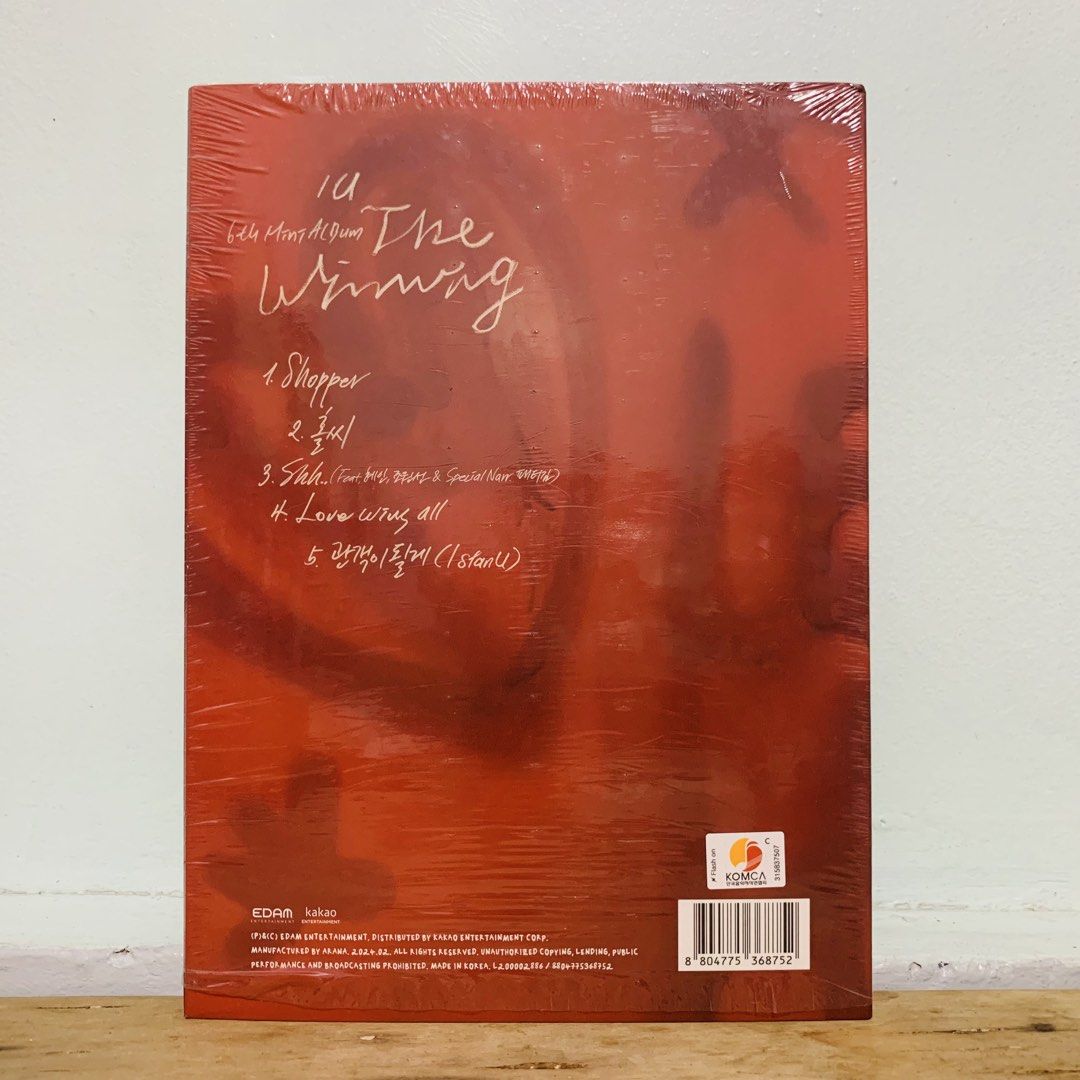 IU The Winning 6th Mini Album (Category: CDs & DVDs) located in Caloocan City. Submitted by offthegridfinds (Listing ID 1465757112, Image 2). Description: - Item: IU 6th Mini Album 'The Winning' - Condition: Brand new, still sealed in original plastic wrap (has minor corner dings and shelf wear) - Tracklist includes: Shopper, Holssi, Shh.., Love wins all, and I stan U - Perfect for Uaenas and K-pop collectors! - Included: CD, photobook.