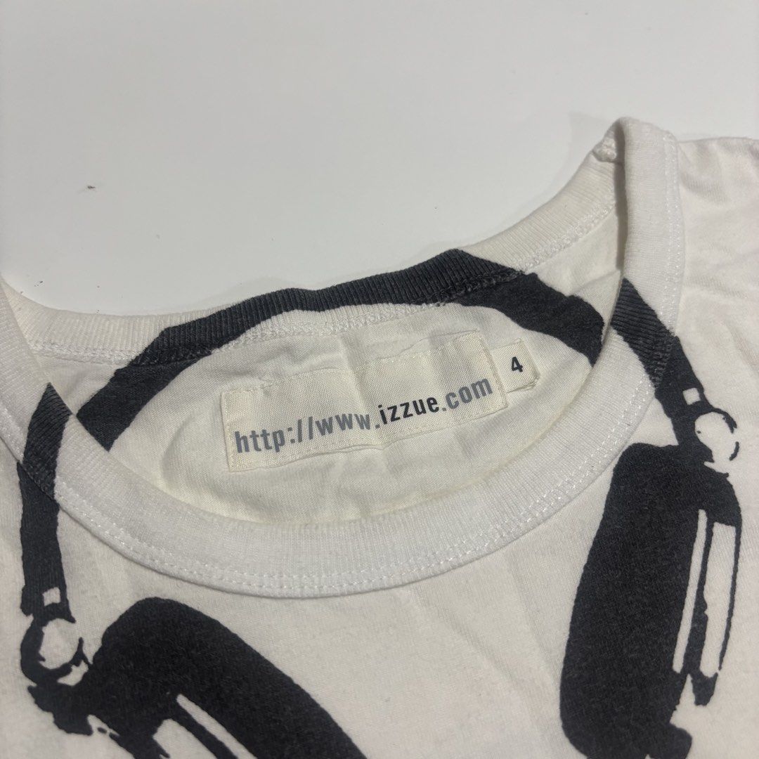 Izzue x Sony Ericsson Walkman Graphic Tee Size 4 (Category: Tshirts & Polo Shirts ) located in Cebu City. Submitted by kidfrom6000 (Listing ID 1465749877, Image 2). Description: - Brand: Izzue x Sony Ericsson Walkman collaboration - Color: White with front headphone and cord graphic - Details: Sony Ericsson branding on right sleeve, Walkman logo on left sleeve - Size: 4 - Material & Care: Cotton, hand wash only - Style: Casual music merch / stree