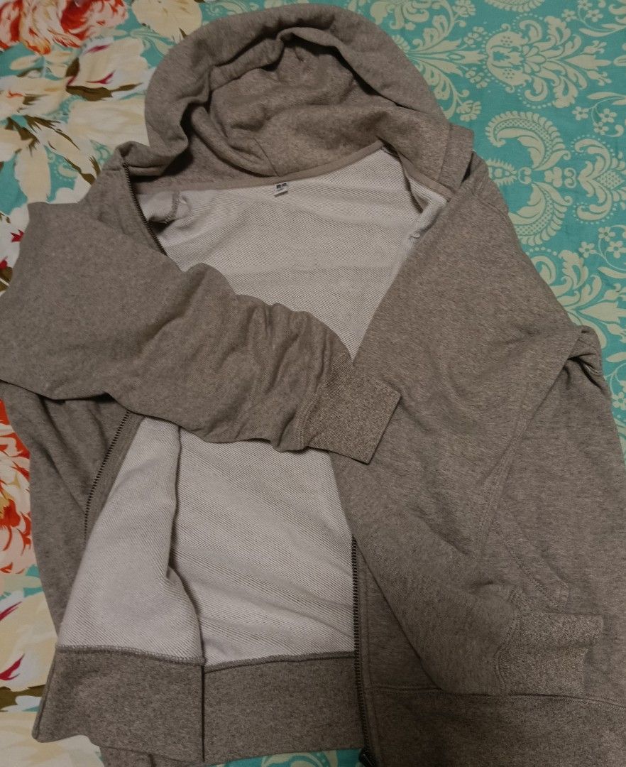 Jacket (Category: Coats, Jackets and Outerwear) located in Singapore. Submitted by flowerbit (Listing ID 1465614627, Image 3). Description: zip up hoodie with front pockets grey colour missing drawstring no deliveries chat to buy.