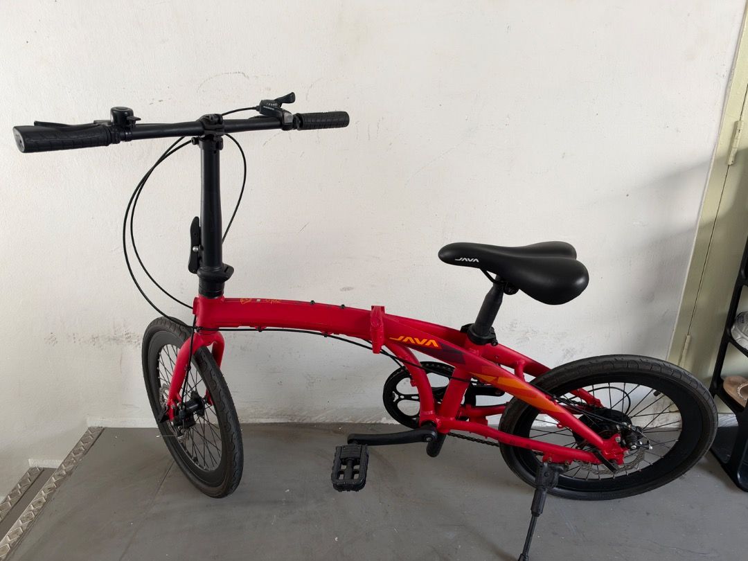 Java Zelo Red Folding Bicycle (Category: Bicycles) located in Singapore. Submitted by melong7608 (Listing ID 1465668060, Image 1). Description: - Brand/Model: Red Java Zelo Folding Bike -20 inch wheels - Gears: Shimano 7-speed - Brakes: Reliable disc brakes front and back -Seat saddle adjustable .
