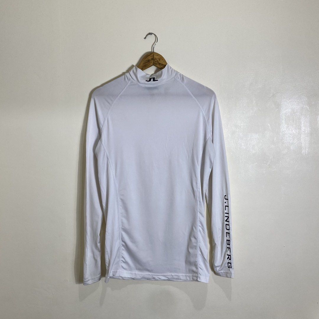 j.lindeberg Maello Slim Soft Compression Long Sleeve Top White Large (Category: Activewear) located in Manila. Submitted by carbertjakosalem (Listing ID 1465754577, Image 1). Description: - Brand: J.Lindeberg (Maello Model) - Color: Crisp White - Size: Large (tag attached) - Fit: Slim soft compression top - Details: Long sleeves with branded lettering, mock neck with back bridge logo - Material: 88% polyester, 12% elastane - Origin: Made in Taiwa
