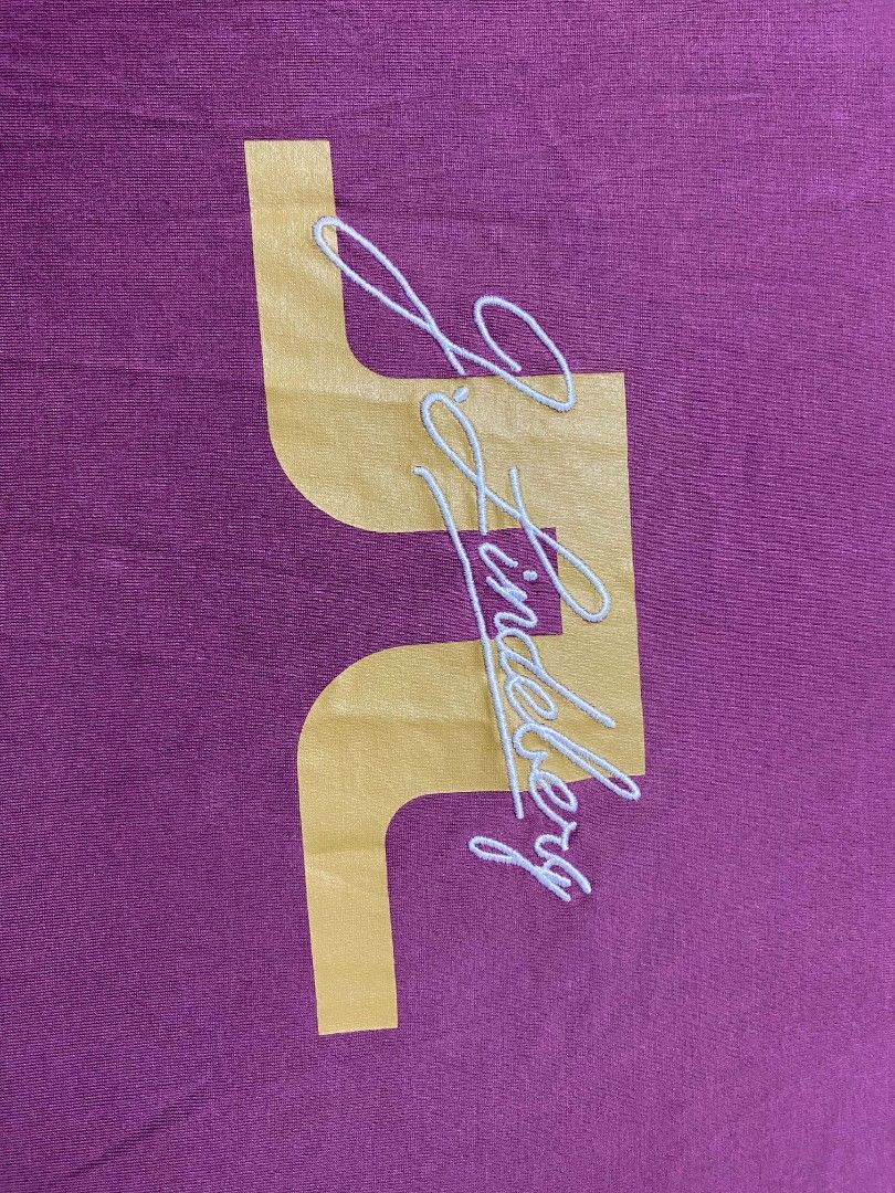 j.lindeberg shirt (Category: Tshirts & Polo Shirts ) located in Manila. Submitted by thrift_sta.20 (Listing ID 1465674841, Image 2). Description: - Brand: J.Lindeberg - Color: Dark Purple - Size: 185/104A - Material: 100% soft cotton for all-day comfort - Design: Large gold logo print with white embroidered script on the chest - Details: Classic ribbed crew neckline - Condition: Clean inside and out, great for casual wear.